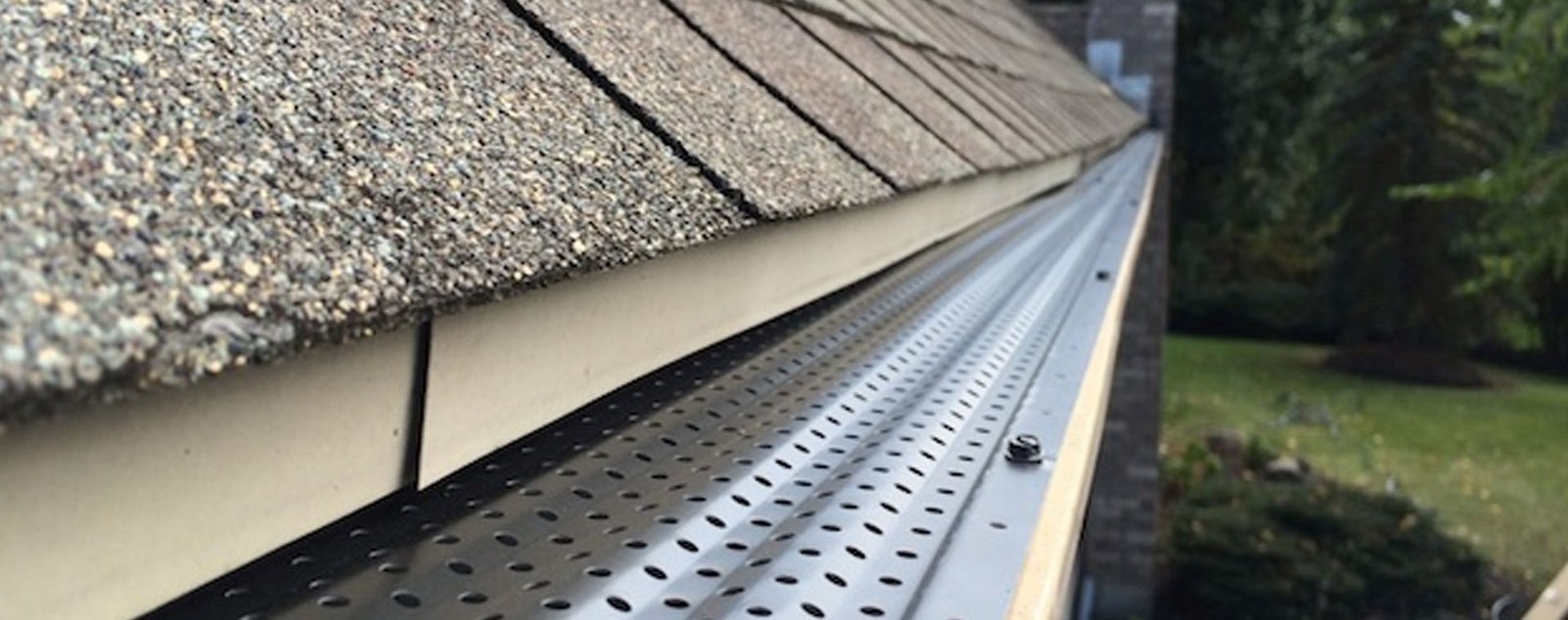Gutter guard installation on a home