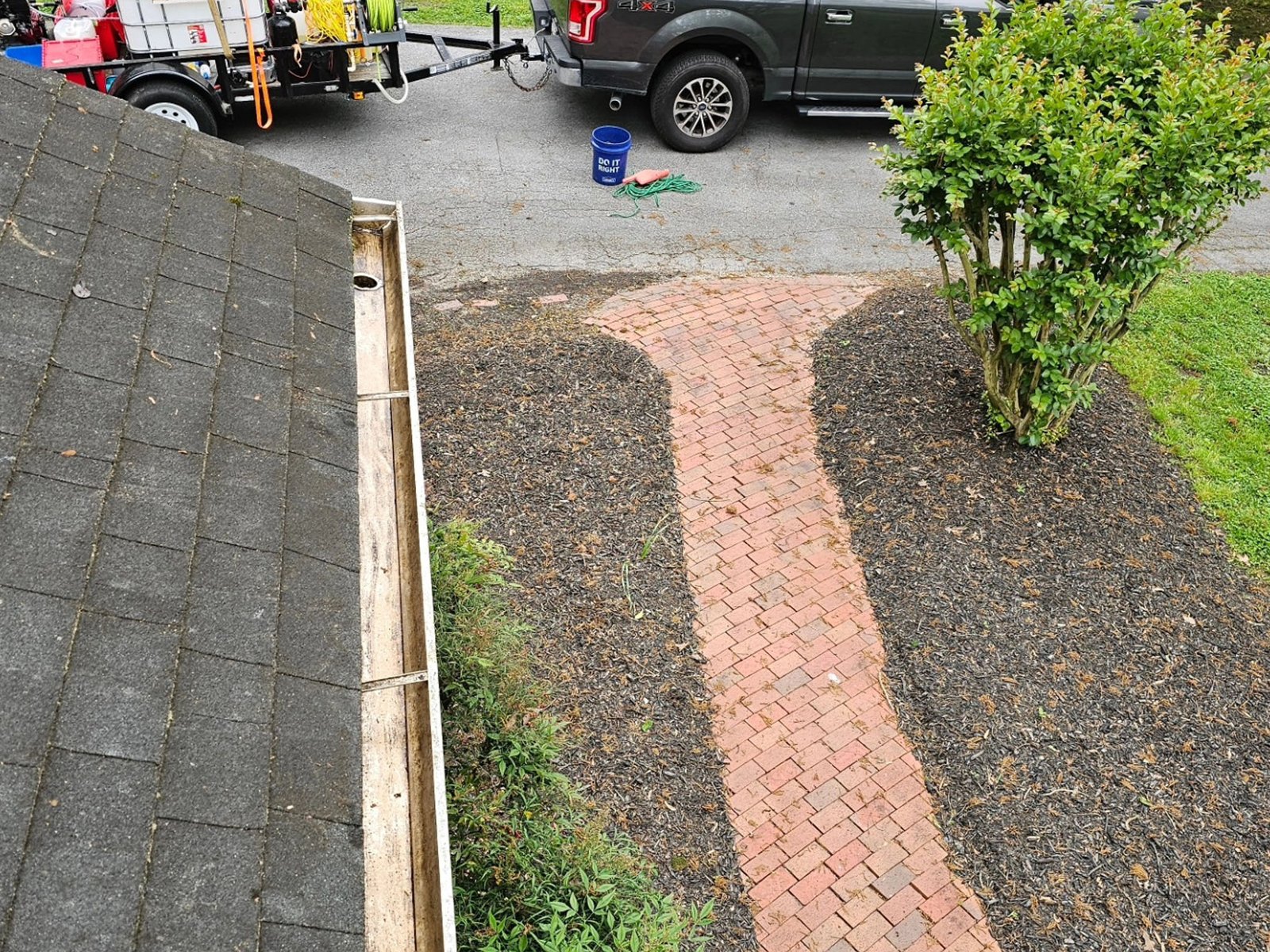 Finished brick paver walkway with landscaping
