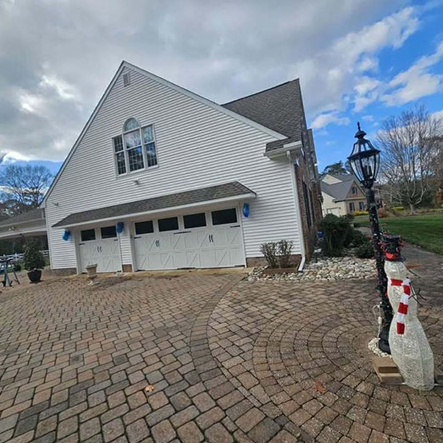 Paver walkway leading to a home's entrance